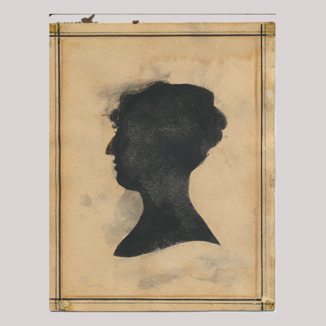 
        Front of silhouette, with woman looking left, in square painted frame.